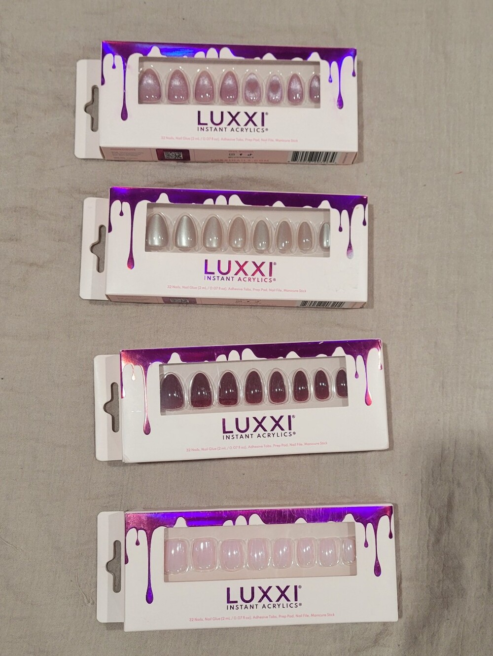 NWOT 4 LUXXI Press on Nails